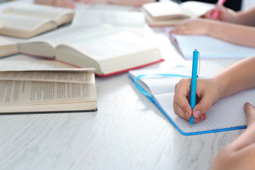 Children doing homework, closeup