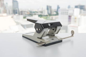 Big paper punches on the white table