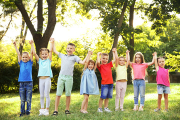 Obraz premium Group of happy kids in park