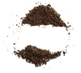 Dark Soil on White Background.Top View of a soil. Close Up Macro