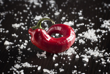 Bitter red pepper on a black table