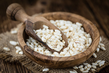 Old wooden table with puffed Rice