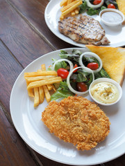 steak salmon with vegetables with vegetables on the plate