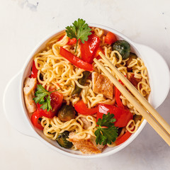 Asian noodles with vegetables and chicken.