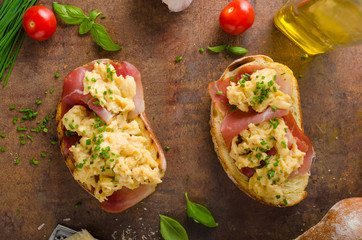 Delicious toasted bread with scrambled eggs