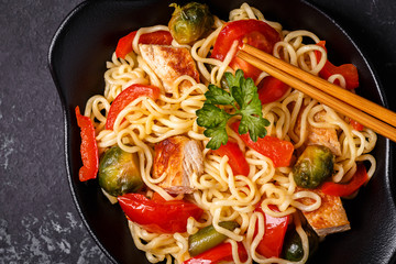 Asian noodles with vegetables and chicken.