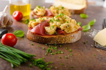 Delicious toasted bread with scrambled eggs