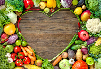 Assortment of  fresh fruist and vegetables in heart shape