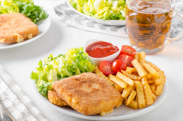 Fried cheese with french fries and lettuce