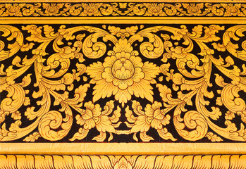 Thai mural in temple thailand gold painting on black background © sarawutnam