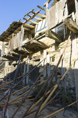 Ancient house restoration, wood and stone houses in the province
