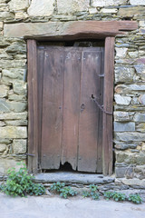 Grunge door, wood and stone houses in the province of Zamora in