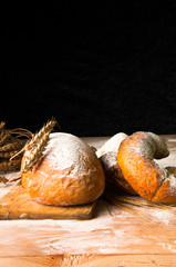 Homemade loaf of bread and ingredients