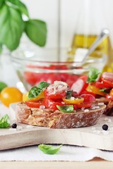 Traditional Italian bruschetta with tomatoes,shallot and basil. Selective focus 