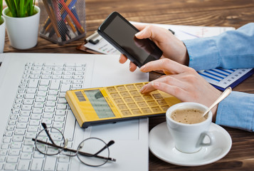 Hands close-up at the office in the composition of objects for business