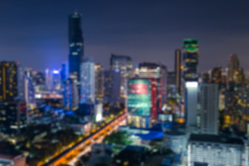 Fototapeta na wymiar Blur Bangkok City midnight colorful metropolis urban Thailand.