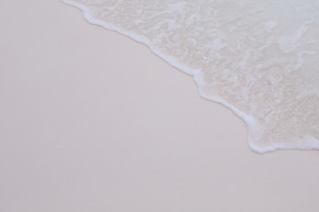 Obraz premium background of wave on a sand