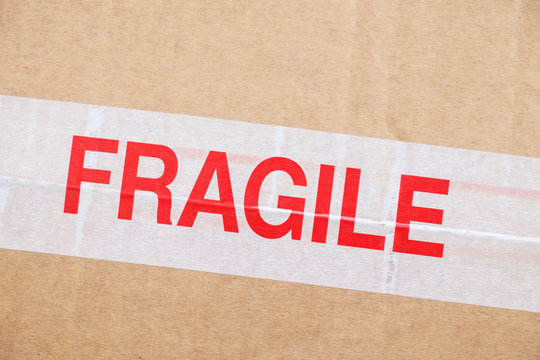Fragile sticker on cardboard box
