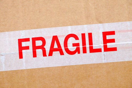 Fragile sticker on cardboard box