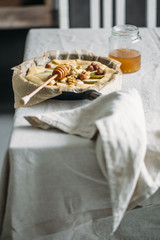 Homemade fresh pear galette with goat cheese and walnuts