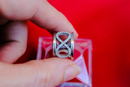 Silver ring with infinity symbol