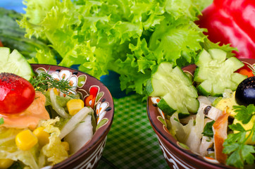 Salad with vegetables, and olives.