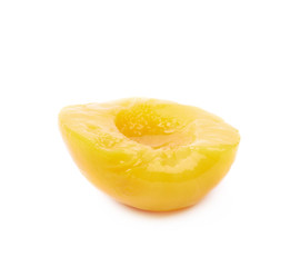 Fototapeta na wymiar Canned peach half isolated