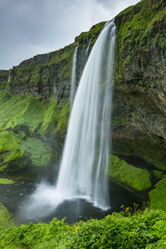 water falling from the hill in Iceland © sergejson