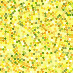 Simple background consisting of small yellow, green, orange circles