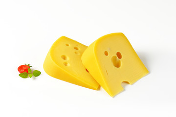 wedges of yellow cheese with eyes