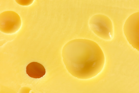 detail of yellow cheese with eyes