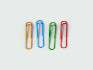 Four Colorful paper clips on a white background 3d rendering