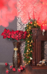 Christmas red poinsettia and yellow garland background