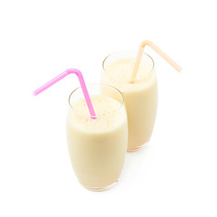 Two glasses of milkshake isolated