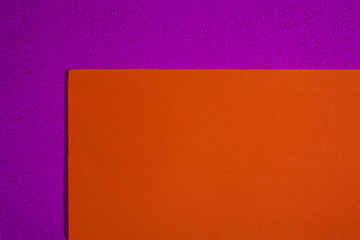 Eva foam ethylene vinyl acetate smooth orange surface on pink sponge plush background