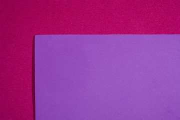 Eva foam ethylene vinyl acetate smooth light violet surface on pink sponge plush background