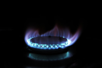 Burning gas burner in the darkness