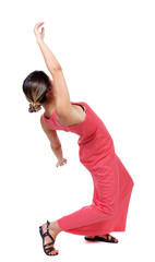 Balancing young woman.  or dodge falling woman. Rear view people collection.  backside view of person.  Isolated over white background. A slender woman in a long red dress falls on his back.