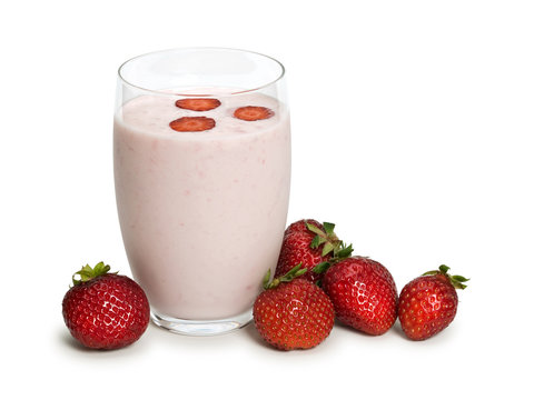 Glass with yoghurt and strawberry berries