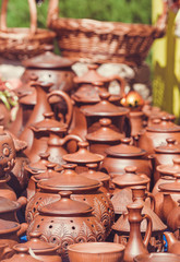 Souvenir pottery on market stand outdoor