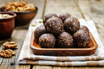 Dates cocoa coconut oats walnuts raw vegan balls