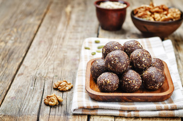 Dates cocoa coconut oats walnuts raw vegan balls