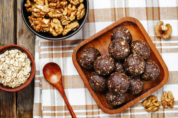 Dates cocoa coconut oats walnuts raw vegan balls
