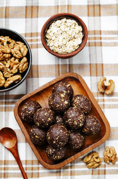 Dates cocoa coconut oats walnuts raw vegan balls