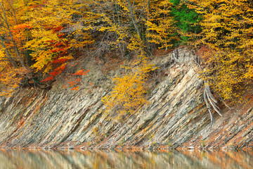 crystal clear mountain lake in autumn