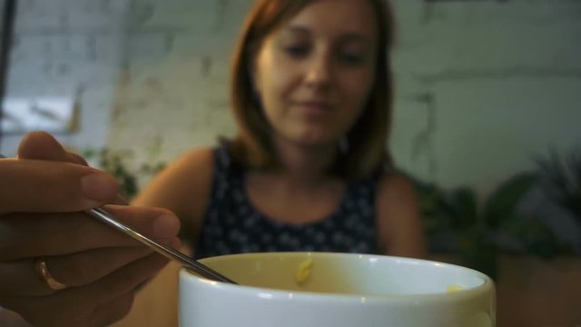 Spoon with hot soup
