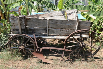 Fototapeta na wymiar An old vintage wooden cart found in a field in Turkey