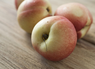 Peaches lie on the old Board. Close-up