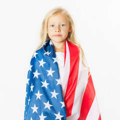 American blonde girl holding American national flag