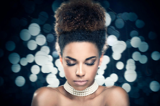 Beauty closeup portrait of girl with afro.